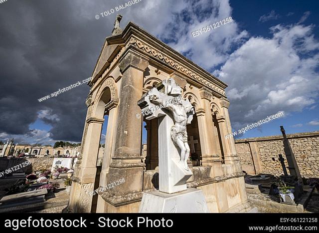 marble cross on the tomb of the Malondra Ferragut family, Santa Margalida cemetery, Mallorca, Balearic Islands, Spain