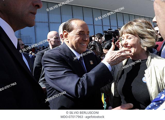 Italian politician Silvio Berlusconi with a Forza Italia militant during the National Assembly of Forza Italia We begin the journey to change Europe and give...