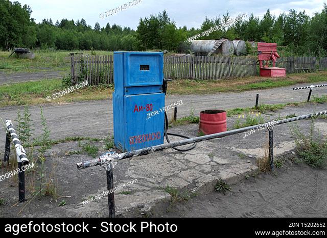 KAMCHATKA PENINSULA, RUSSIA - 30 JULY, 2018: Blue old Soviet fuel dispenser with mechanical counter scoreboard for gasoline fuel at provincial gas station in...