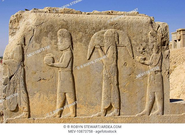 Doorway, Persepolis, Iran. Relief carving depicting representatives of subject nations bringing gifts to the Persian kings