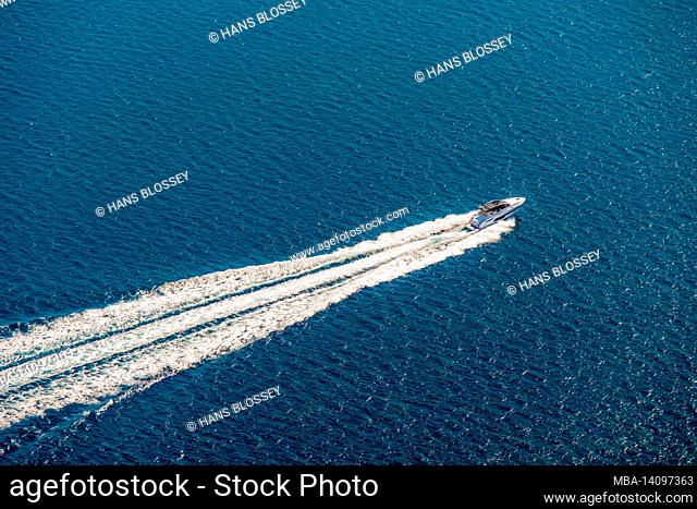 aerial view, fast motorboat in turquoise blue water in the bay of alcudia, palmanyola, bunyola, mallorca, balearic island, balearic islands, baleares, spain