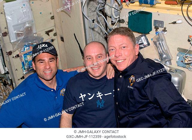 From the left, astronauts Greg Chamitoff, Expedition 17 flight engineer, Garrett Reisman, newly transferred from ISS duty to mission specialist duty on STS-124