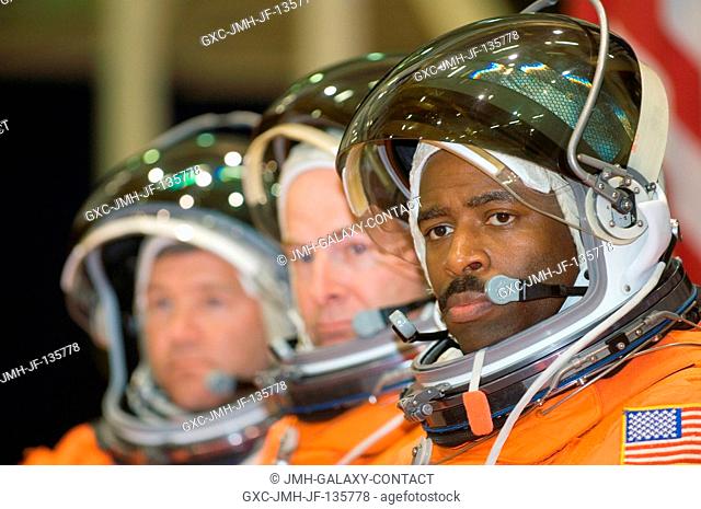 Astronauts Stephen N. Frick (left), STS-122 commander; Alan G. Poindexter, pilot; and Leland D. Melvin, mission specialist
