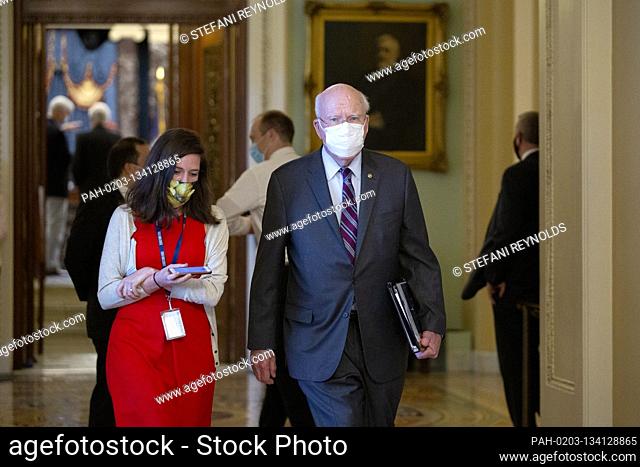 United States Senator Patrick Leahy (Democrat of Vermont) speaks to a reporter as he leaves the Senate floor following votes at the U.S