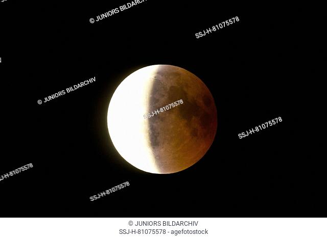 Total lunar eclipse on July 27, 2018, also called blood moon. Schleswig-Holstein, Germany