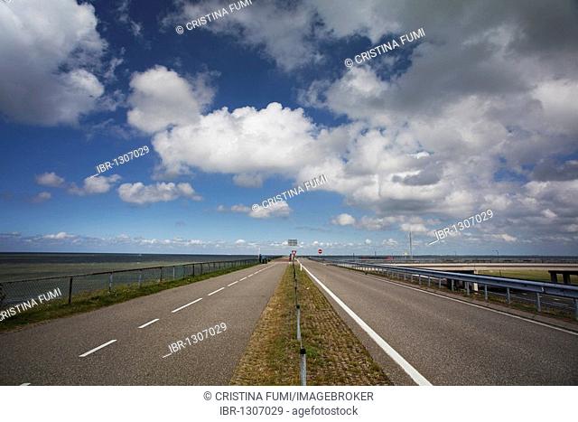 Highway road on the dyke between North Holland and Friesland, Afsluitdijk, Ijsselmeer, Netherlands, Europe