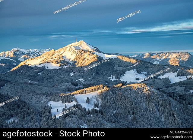 Alpine mountain landscape in winter. Morning illuminated Grünten mountain in Allgäu Alps. Bavaria, Germany, Europe