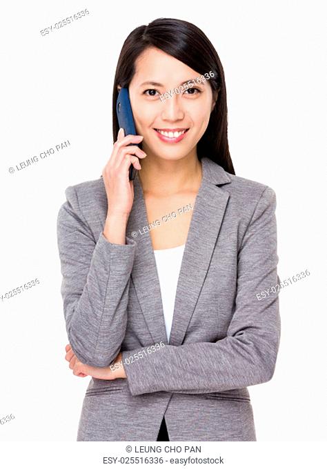 Young businesswoman talk to mobile phone