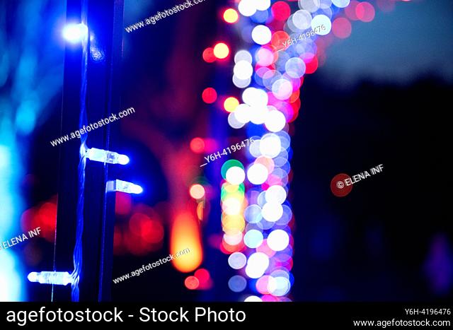 Captivating holiday lights in close-up with a dazzling bokeh effect, creating a magical and festive atmosphere