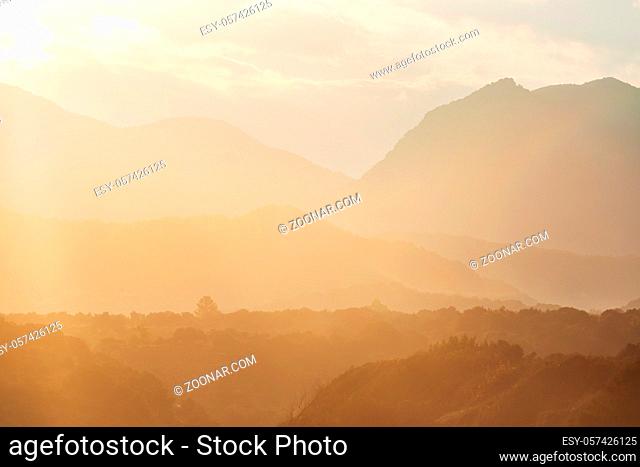 Mountains silhouette at sunrise. Beautiful natural background