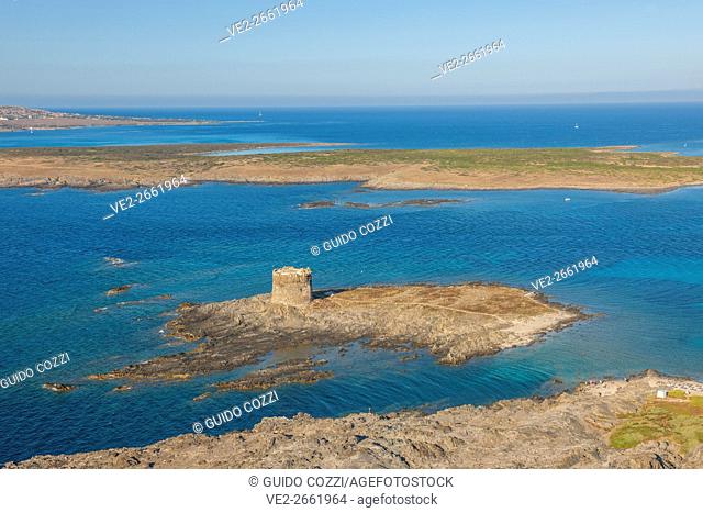 Italy, Sardegna (Sardinia), Stintino. View of Torre della Pelosa, Isola Piana and Asinara island from Capo Falcone