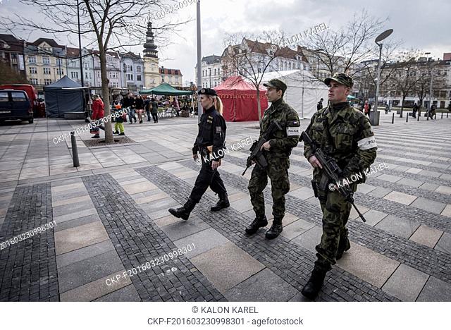 Police officers and soldiers patrol the streets of Ostrava, Czech Republic, Wednesday, March 23, 2016. Authorities in Europe have tightened security at airports