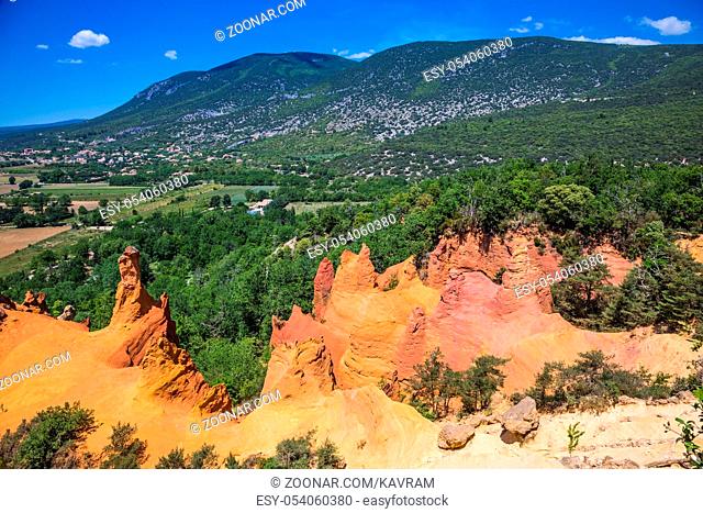 The pit on production ochre. Languedoc - Roussillon, Provence, France. Orange picturesque hills