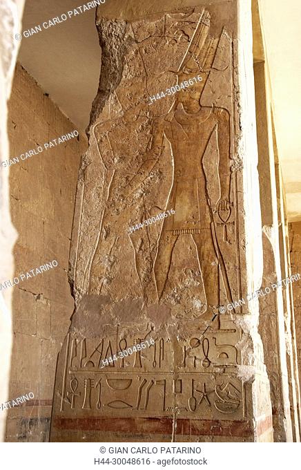 Deir el Bahari, Luxor, Egypt: temple of the queen Hatshepsut (New Kingdom 1567-1080 b.C.) at Deir el Bahari called Djeser-Djeseru: the king and the god Amon...