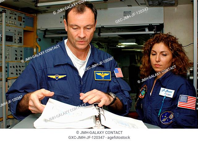 Astronaut Michael E. Lopez-Alegria, Expedition 14 commander and NASA ISS science officer, trains for his upcoming flight with spaceflight participant Anousheh...