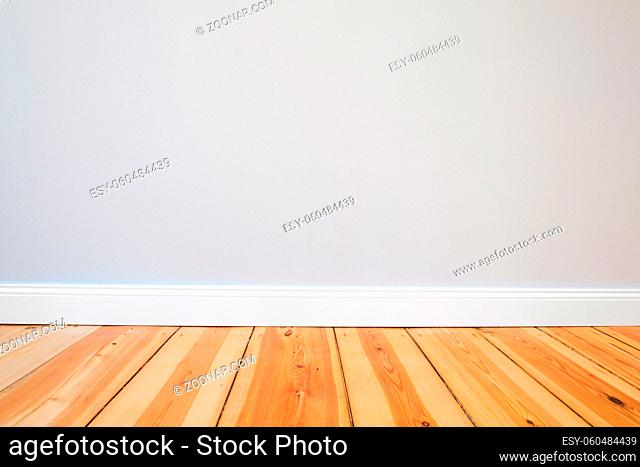 wooden floor and painted walls - renovation concept background