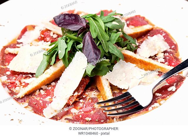 Beef Carpaccio with shaved parmesan cheese