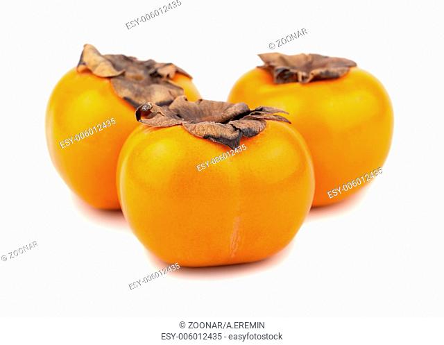 Three persimmon fruits