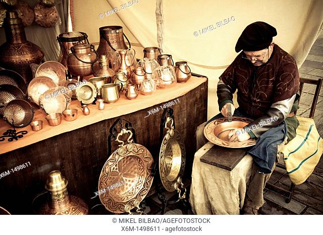 Craftsman working  Medieval Fair  Balmaseda, Biscay, Spain