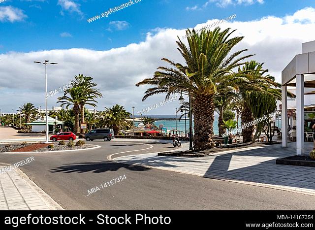 street with shops and restaurants, costa teguise, lanzarote, canaries, canary islands, spain