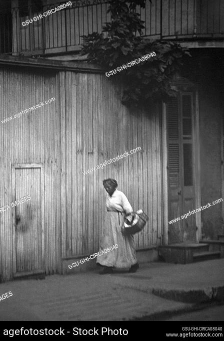 Woman going to market, New Orleans, Louisiana, USA, Arnold Genthe, 1920's