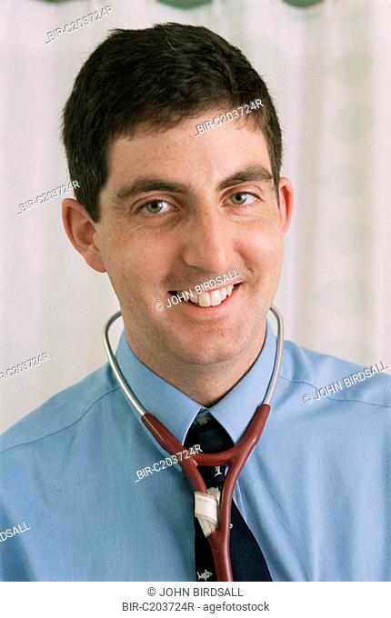 Portrait of doctor wearing stethoscope around neck smiling