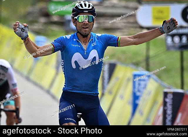 Spanish Alejandro Valverde of Movistar Team celebrates as he crosses the finish line to win the sixth stage of the 73rd edition of the Criterium du Dauphine...