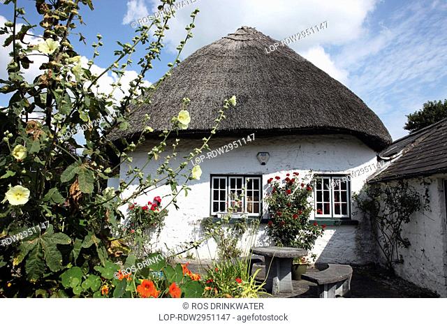 Republic of Ireland, County Limerick, Adare. Thatched cottage in Adare, a small village famous for its antique shops