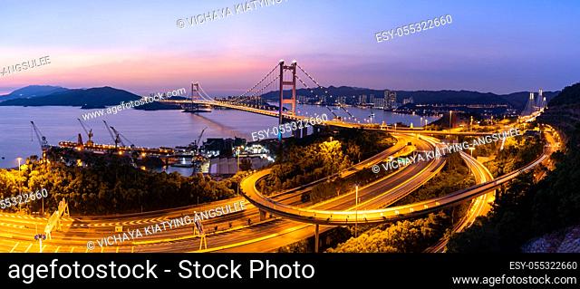 Panorama of Sunset and light illumination of Tsing ma bridge landmark suspension bridge in Tsing yi area of Hong Kong China