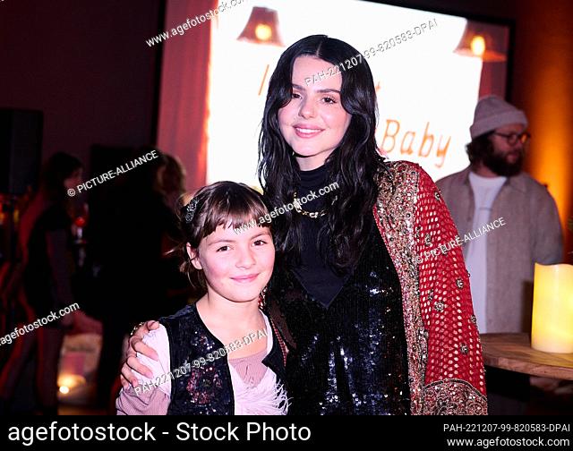 07 December 2022, Berlin: Ruby O Fee (r) joins Mirle Schimpf (9) for the premiere of the Netflix YouTube film ""I Am Not Your Baby, "" which is about her story