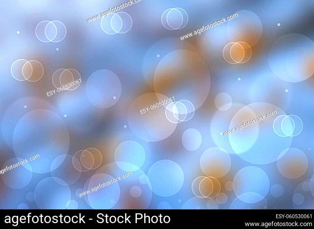Festive light brown blue silver bright abstract bokeh background with white circles. Template for your design. Beautiful texture