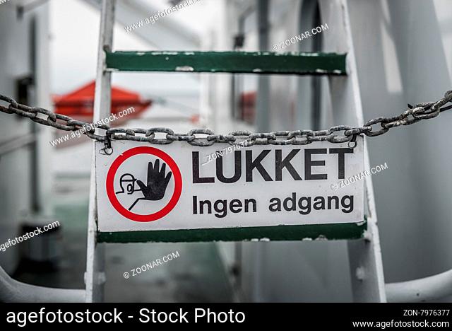 No access sign on a metal chain by a ladder