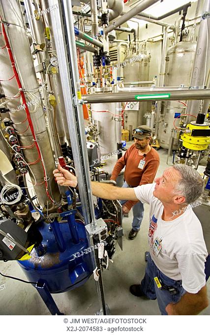 Batavia, Illinois - Cryotechniciansrun equipment that provides liquid helium in the New Muon Lab at the Fermi National Accelerator Laboratory