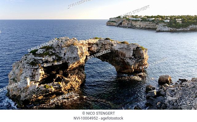 Natural arch in sea, Es Pontas, Cala Santanyi, Majorca, Spain