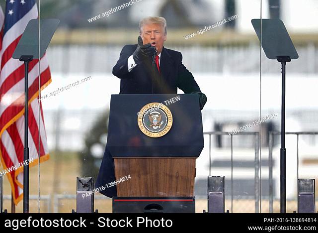 US President Donald J. Trump delivers remarks to supporters gathered to protest Congress' upcoming certification of Joe Biden as the next president on the...