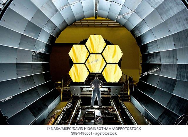 Next Generation Space Telescope  NASA engineer Ernie Wright looks on as the first six flight ready James Webb Space Telescope's primary mirror segments are...