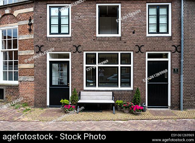 Hattem, Gelderland, The Netherlands, 07 14 2022 - Traditional facades of decorated houses