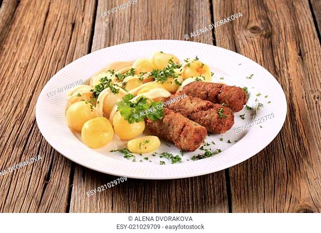Cevapcici and potatoes