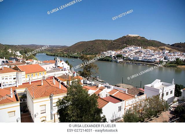 the town Alcoutim in Portugal and the town Sanlucar de Guadiana in Spain at the river Rio Guadiana on the Border of portugal and Spain at the east Algarve in...