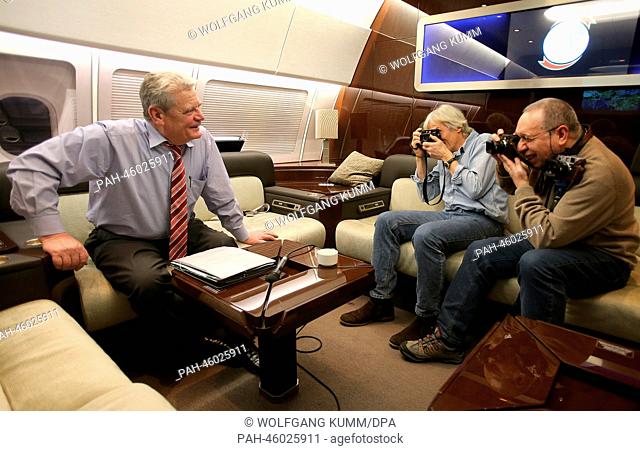 German President Joachim Gauck (L) is photographed in a conference room of the government airplane on the flight to New Delhi, India, 04 February 2014