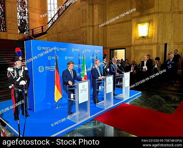 30 October 2023, Italy, Rom: Economics Minister Robert Habeck (Bündnis 90 /Die Grünen, on the podium, l-r), the head of department at Italy's Ministry of...