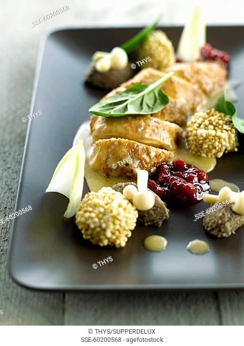 Bresse hen in cider, cranberry sauce, golden mushrooms, anchoyade quenelles and crunchy pearl barley croquettes