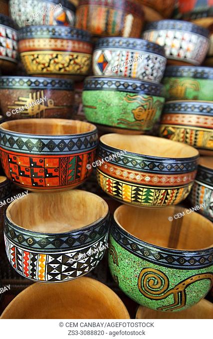 Close-up shot of of wooden bowls at the open-air art and craft market in Pisac, Sacred Valley, Cusco Region, Peru, South America