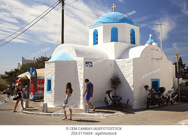Tourists in front of a blue domed church in the town center, Naxos Island, Cyclades Islands, Greek Islands, Greece, Europe