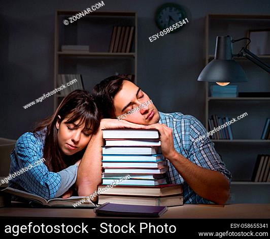 The two students studying late at night