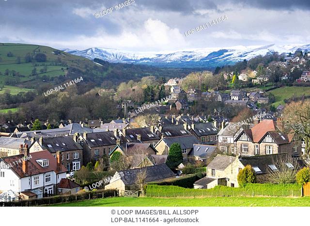 Hathersage in the Peak District in Derbyshire beneath snow covered Mam Tor and Lose Hill