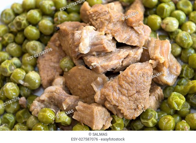 veal stew with peas and onion