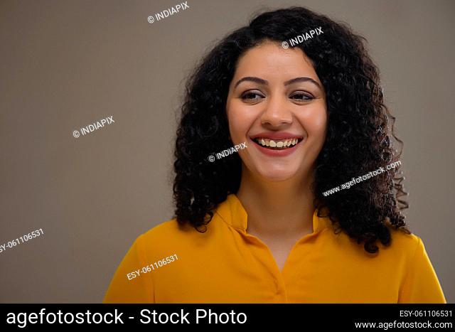 Portrait of a happy beautiful woman smiling
