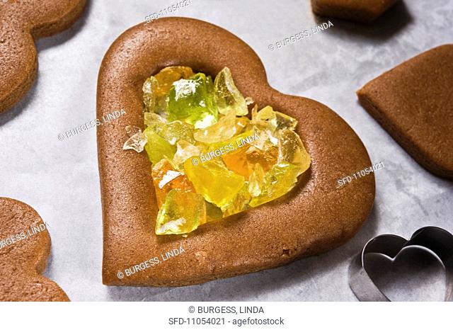 A gingerbread heart filled with crushed fruit sweets