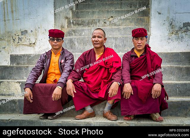 Monks prepared to watch the ritual dance performance at the Korzok Buddhist Festival, Ladakh. India